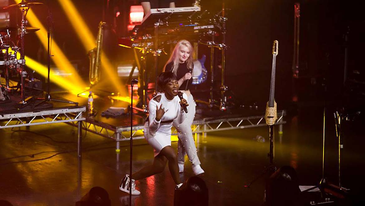 Clean Bandit performing on tour with DPA microphones on their instruments.